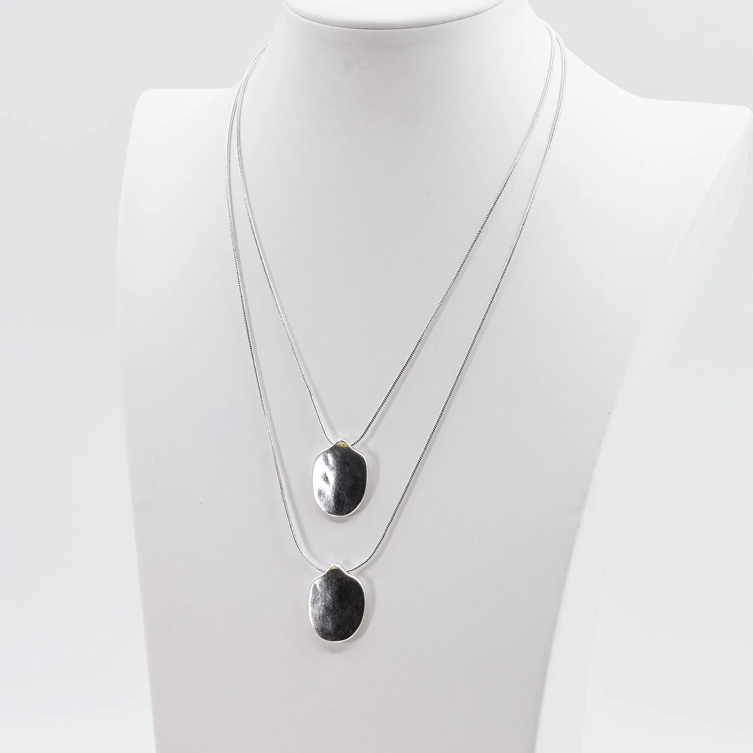 Double layered  necklace with soft hammered pendants