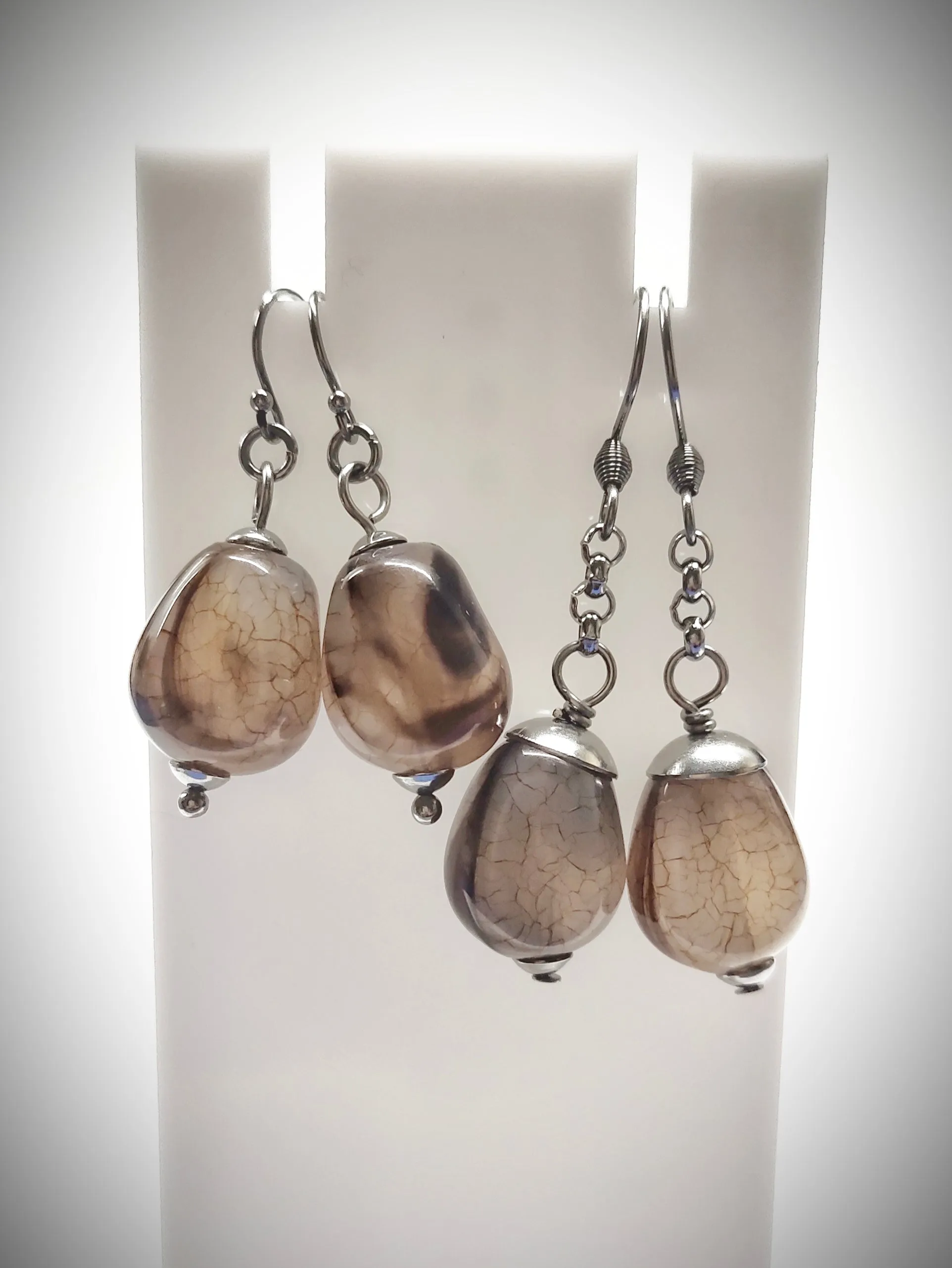Matching greyish brown bead earrings for mother and daughter