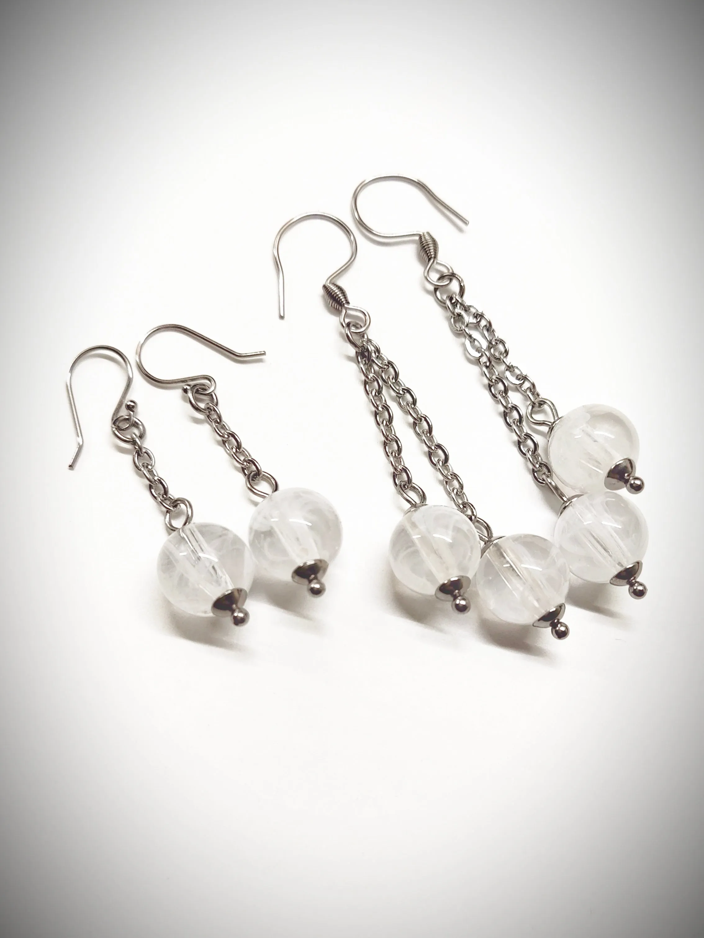Matching semi clear white bead earrings for mother and daughter