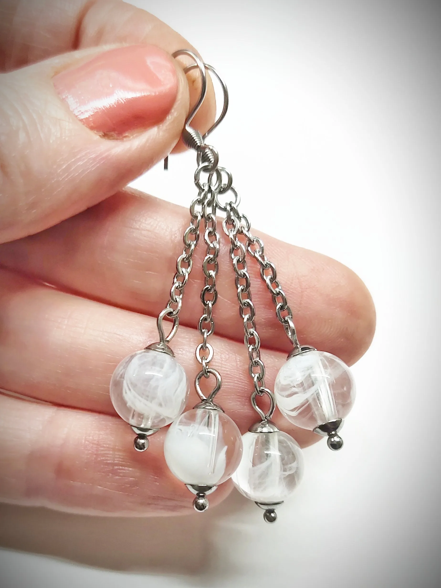 Matching semi clear white bead earrings for mother and daughter