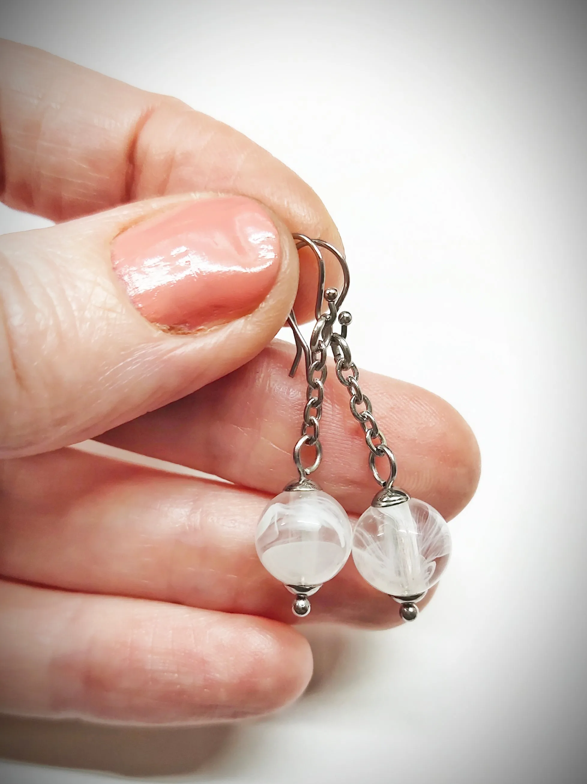 Matching semi clear white bead earrings for mother and daughter
