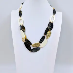 Organic resin shapes with metal components and 2 strand section necklace