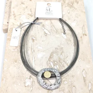 Organic shape with crystals on multi wire necklace
