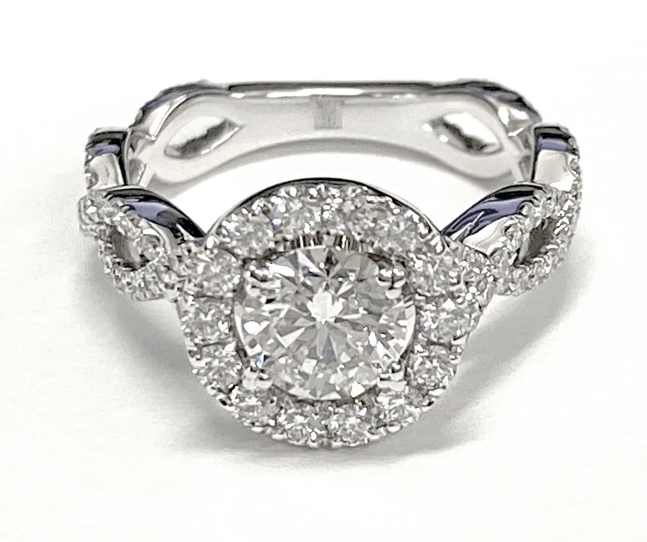 Platinum Round Brilliant Diamond Ribbon Twist French Pave Halo Engagement Ring -3/4ctw