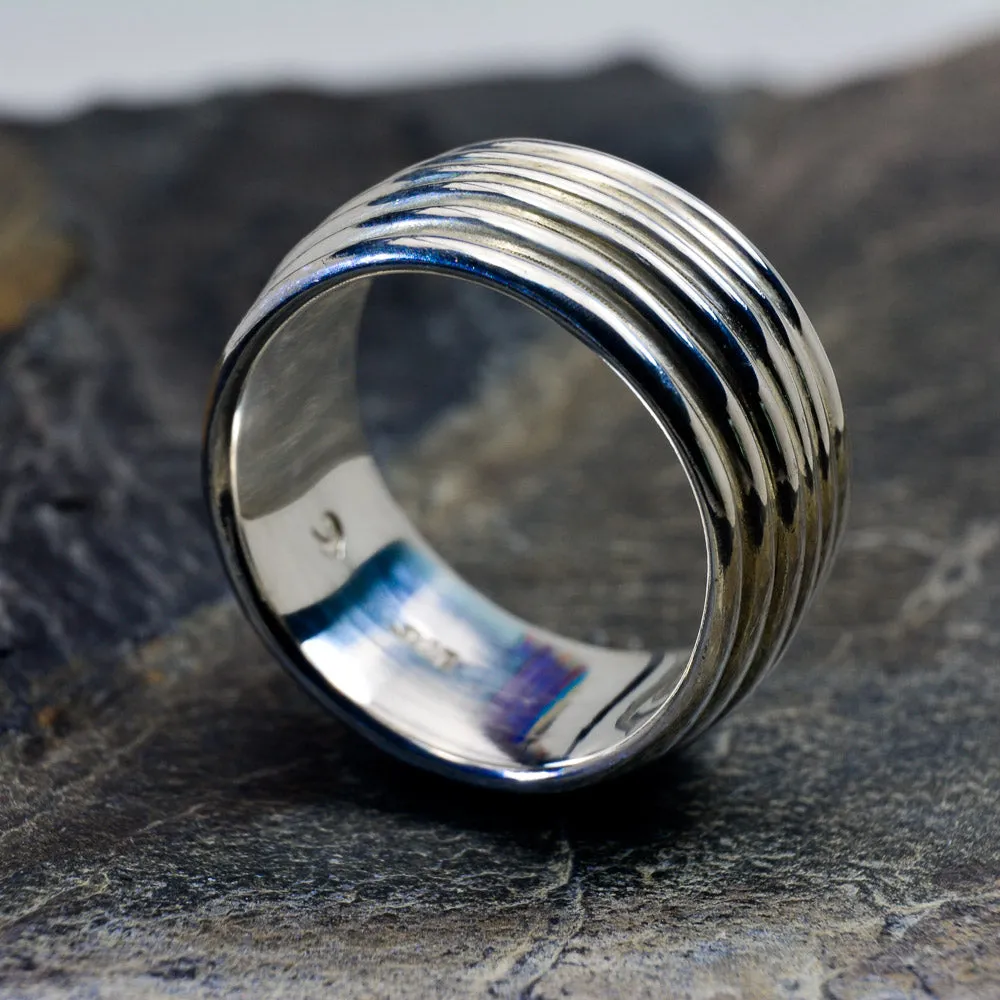 Revolutions: A Bold and Elegant Sterling Silver Ring with Six Loops