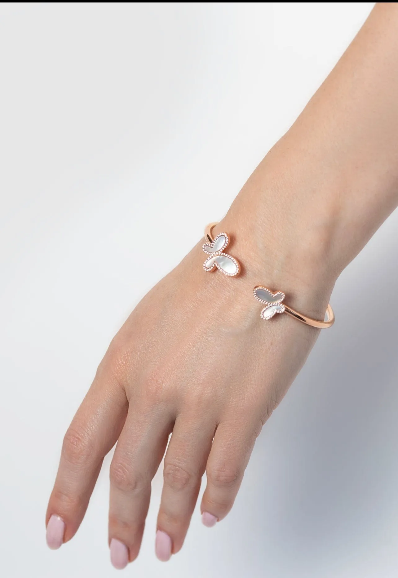 Silver bracelet  with two mother of pearl butterfly