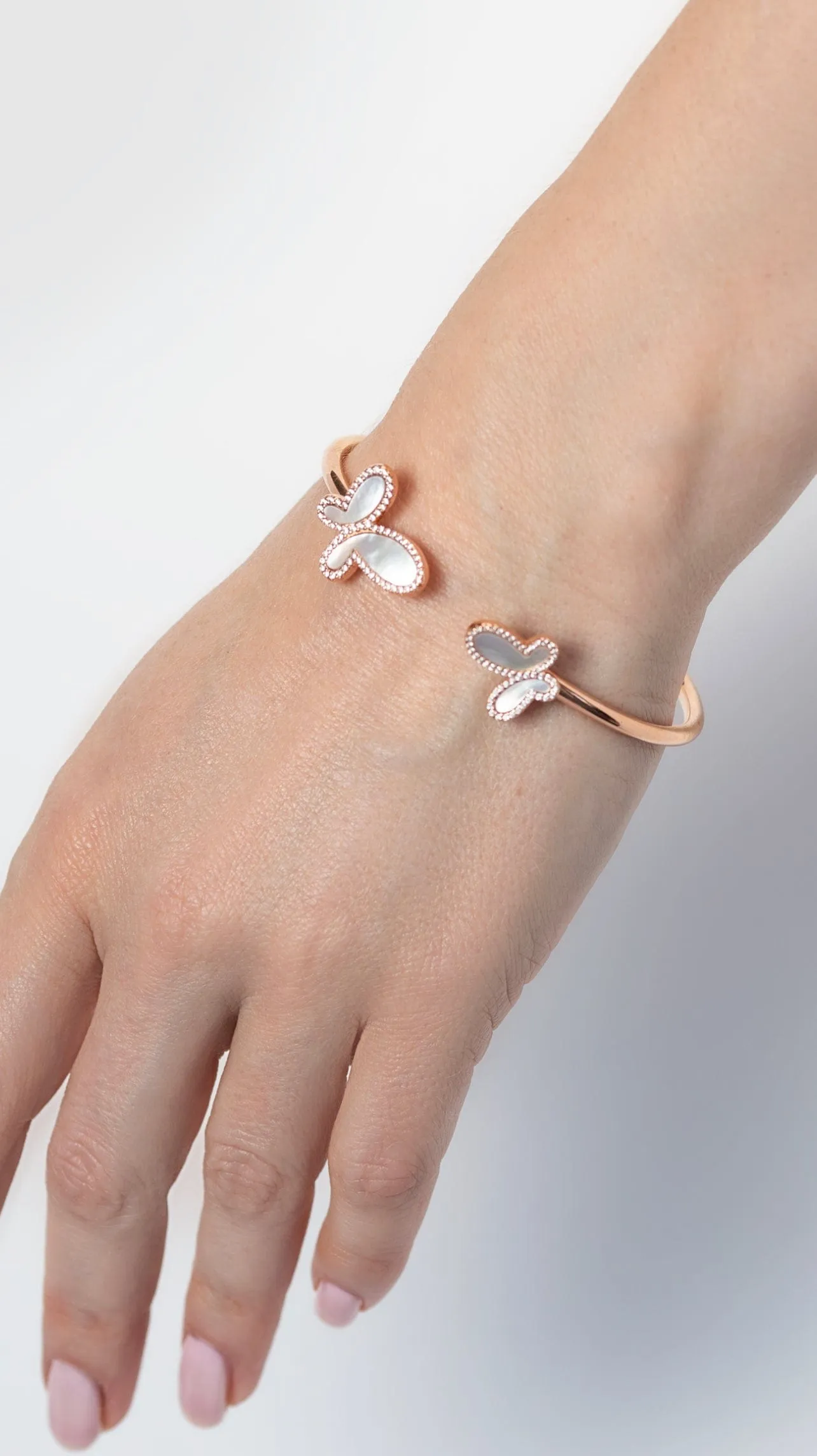 Silver bracelet  with two mother of pearl butterfly